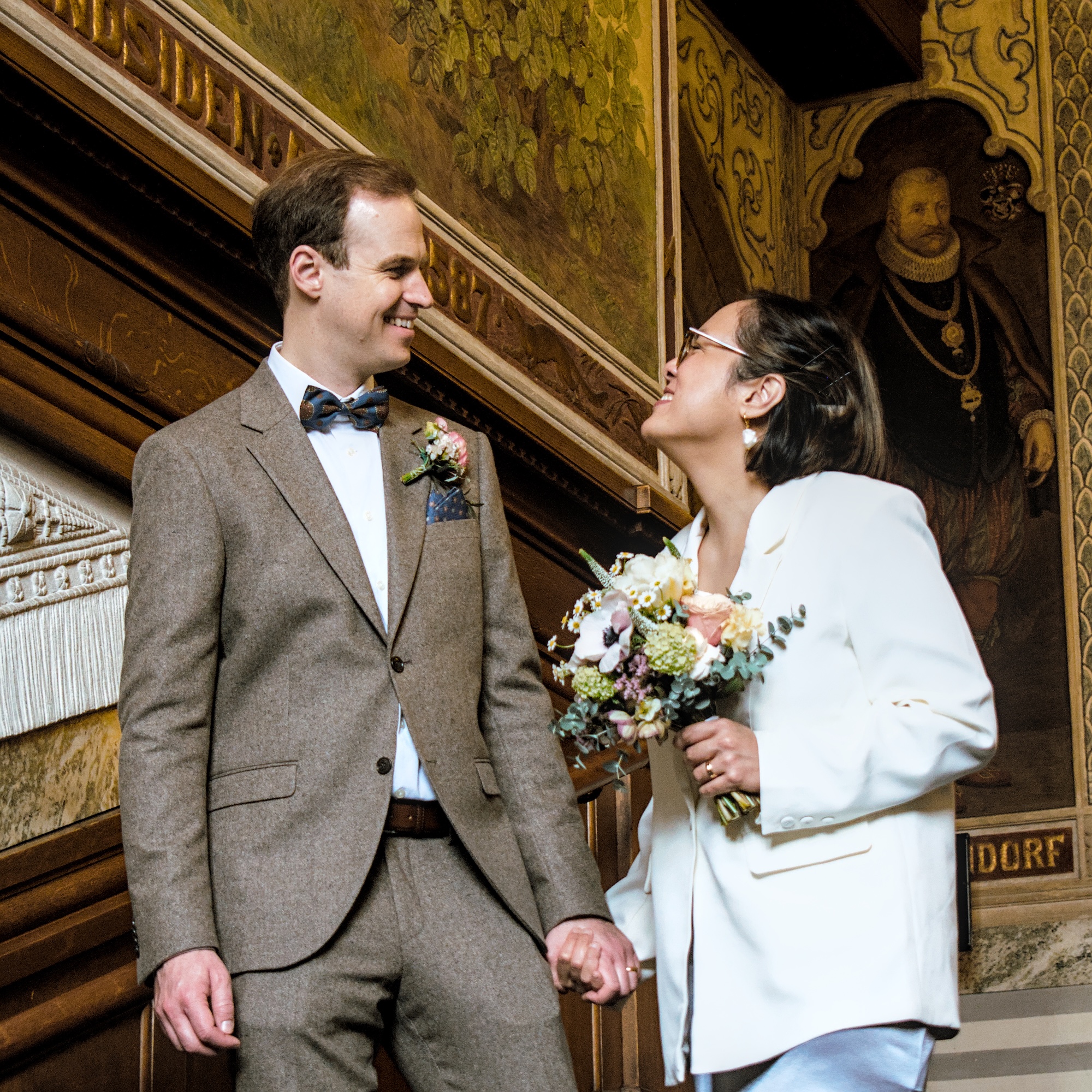 Candid moment on the marble staircase at Rådhus